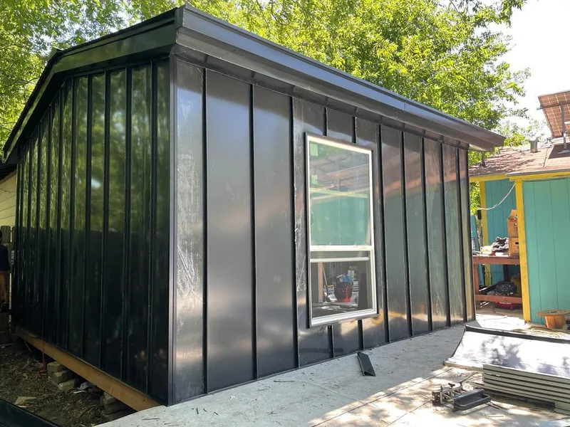 Black standing seam metal wall panels for Roof Inspection in Glenwood Springs