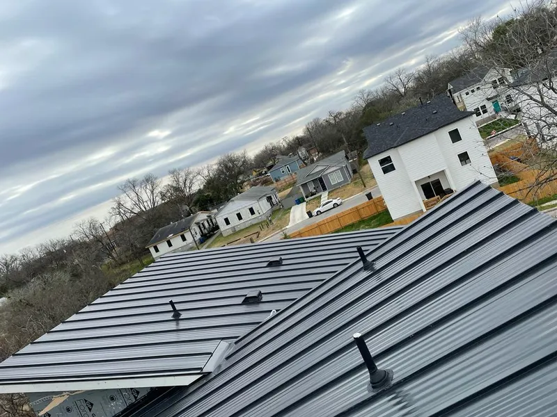Standing seam metal roof panels with vents for Skylight Repair in Glenwood Springs
